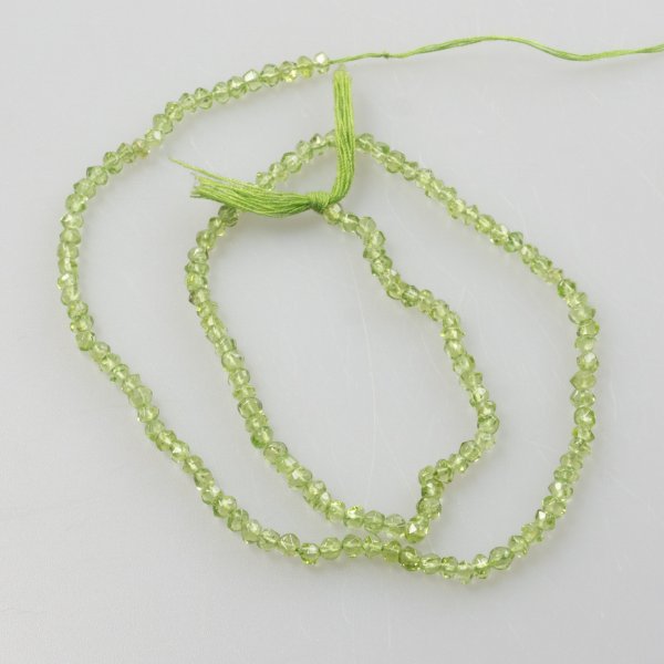Peridot faceted washers, DIY jewelry | Length 40 cm, stone 3 x 2,5 mm