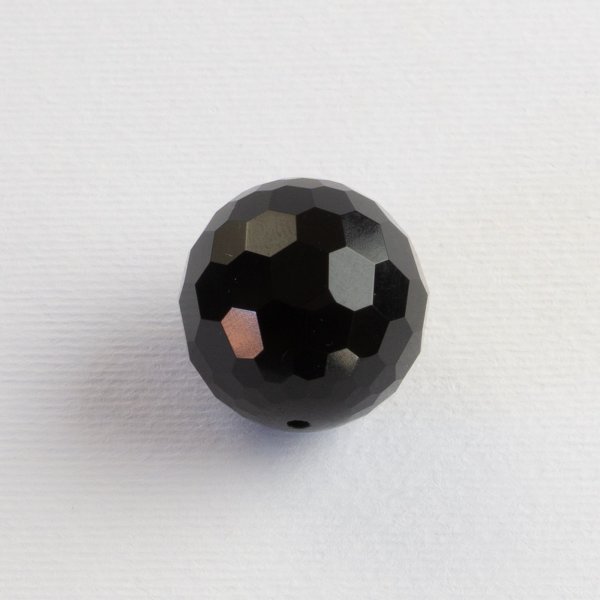 Faceted onyx, round perforated bead